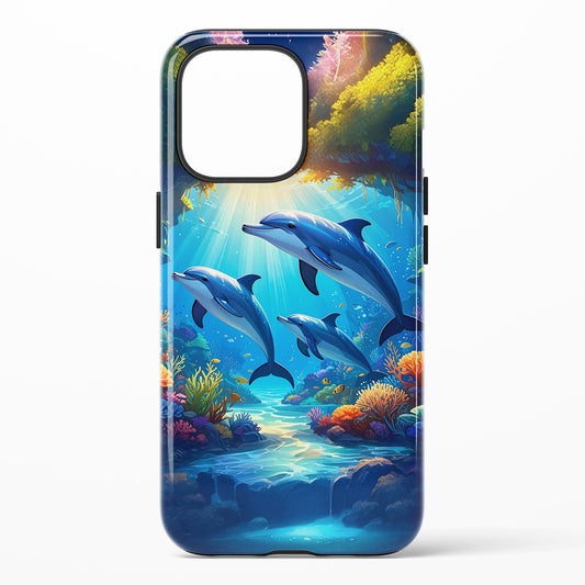 Phone case with three dolphins in blue water with sunlight and coral reef 