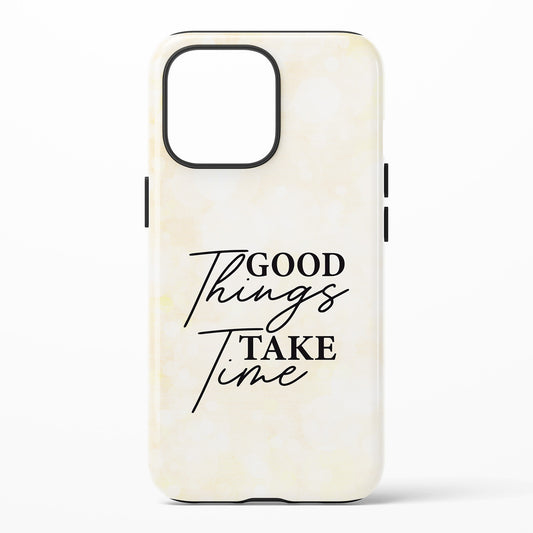 Phone case with 'Good Things Take Time' text on a white background