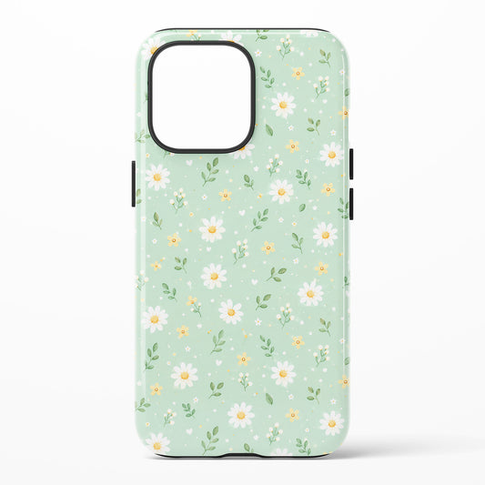 A phone case with a light mint green pastel background and a delicate mini daisy with yellow center floral pattern in white, yellow, and green colors