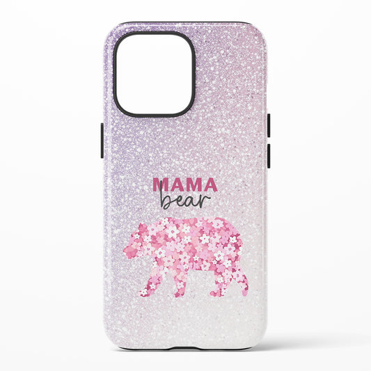 Phone case with 'Mama bear' design featuring a pink floral bear silhouette on a glittery background.