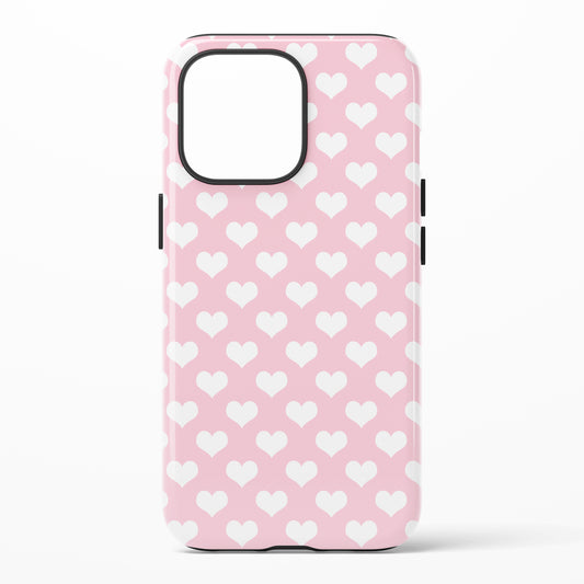 Phone case with white hearts pattern on pink background