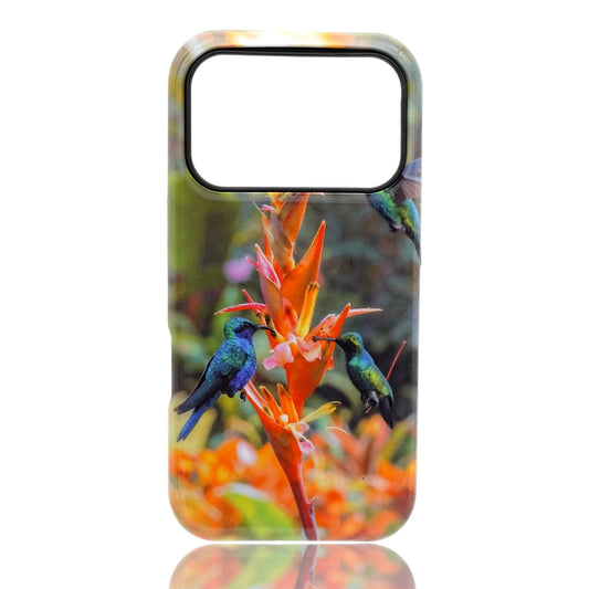 Phone case featuring colorful hummingbirds feeding from a bright tropical flower with green foliage in the background