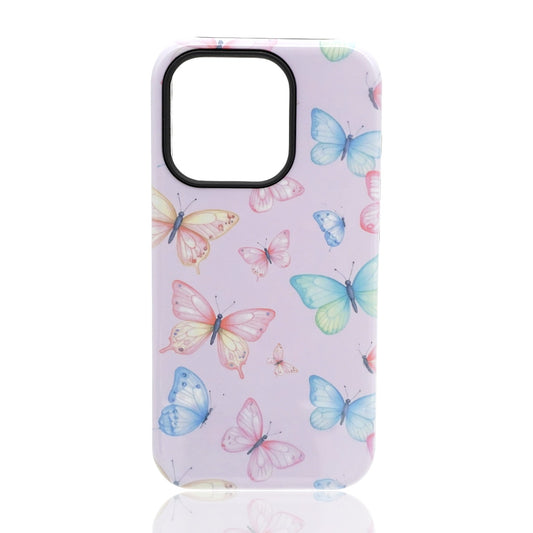Phone case featuring multicolor pastel butterflies on a soft pink background